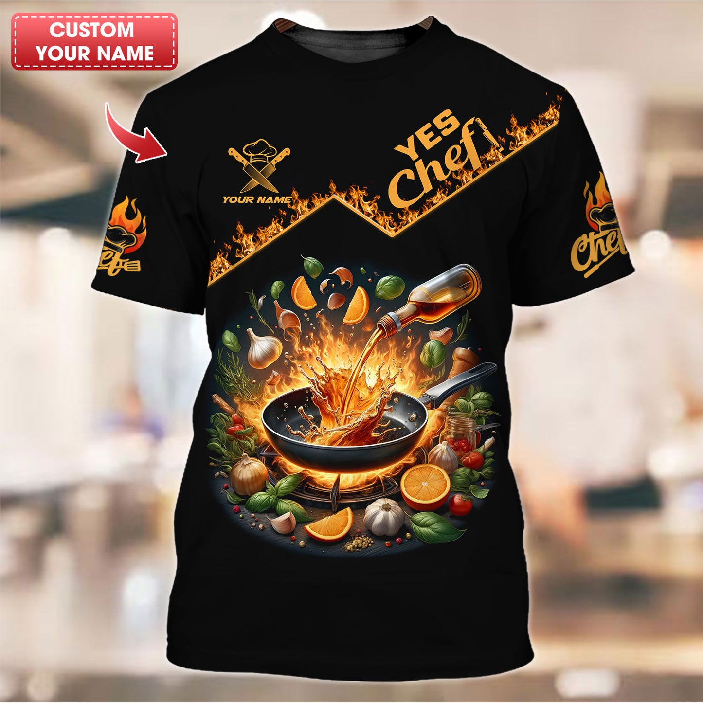 Camisa de chef personalizada: sartén chisporroteante y salpicaduras de ingredientes vibrantes